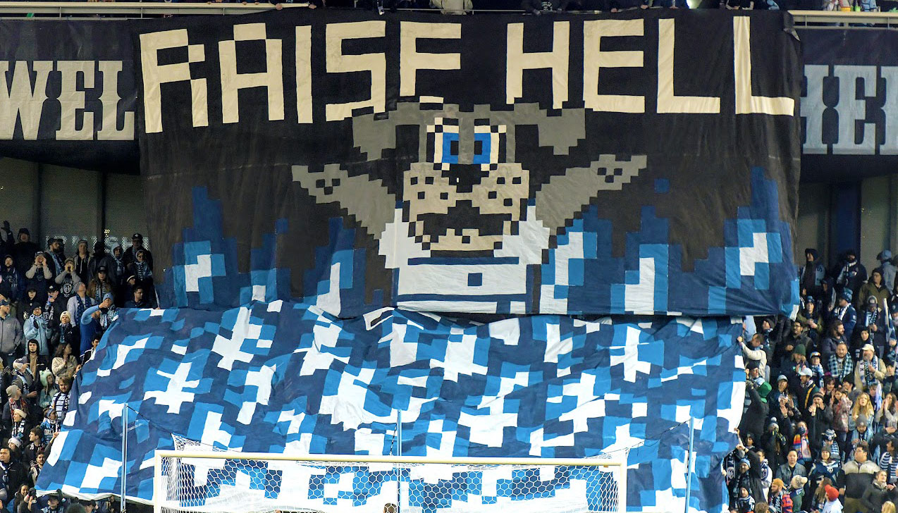 Raise Hell 8-bit tifo with Sporting Bule mascot.